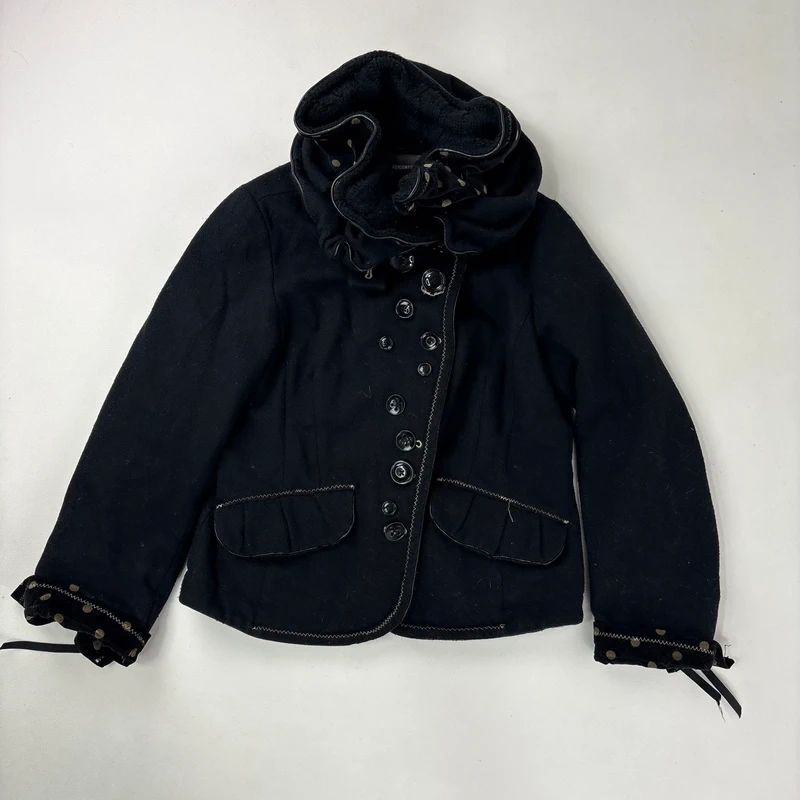 black structured asymmetric polkadot coat