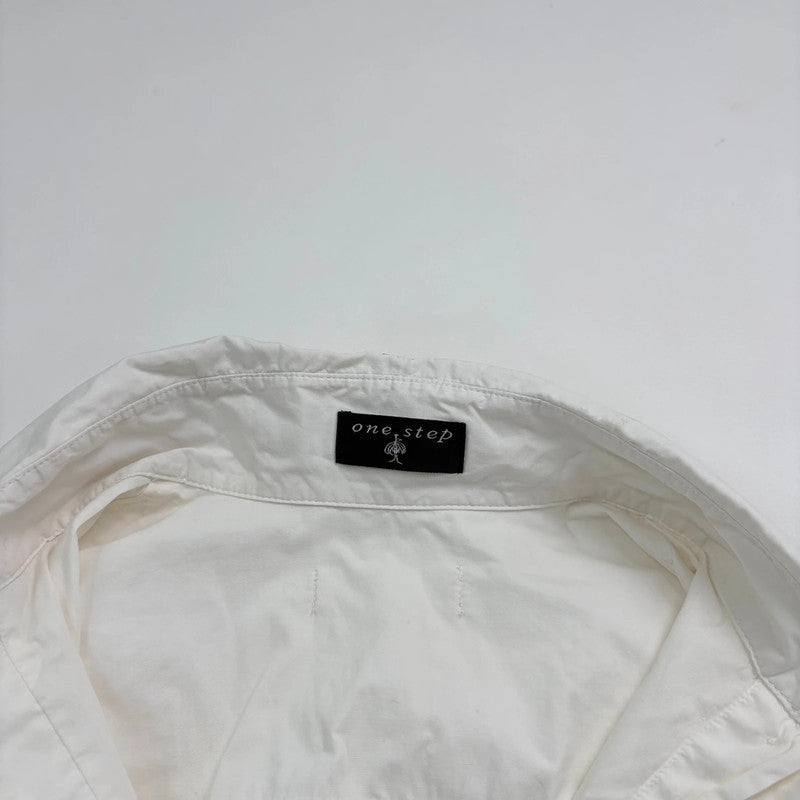 white cinched pleated flared shirt