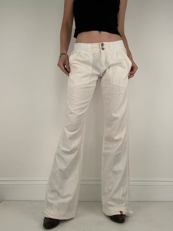 White low rise wide leg flared linen trousers