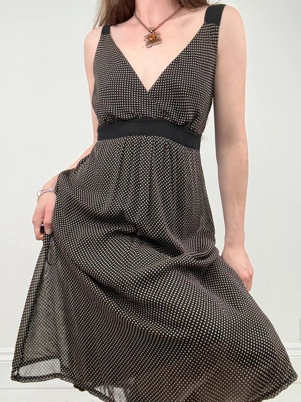 black polkadot flared midi dress