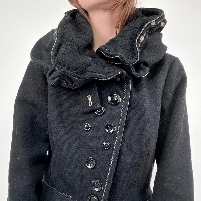 black structured asymmetric polkadot coat
