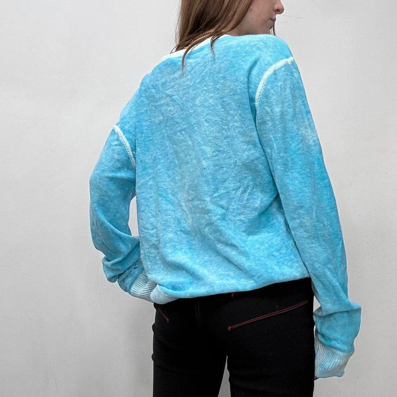 Slouchy oversized distressed knit jumper