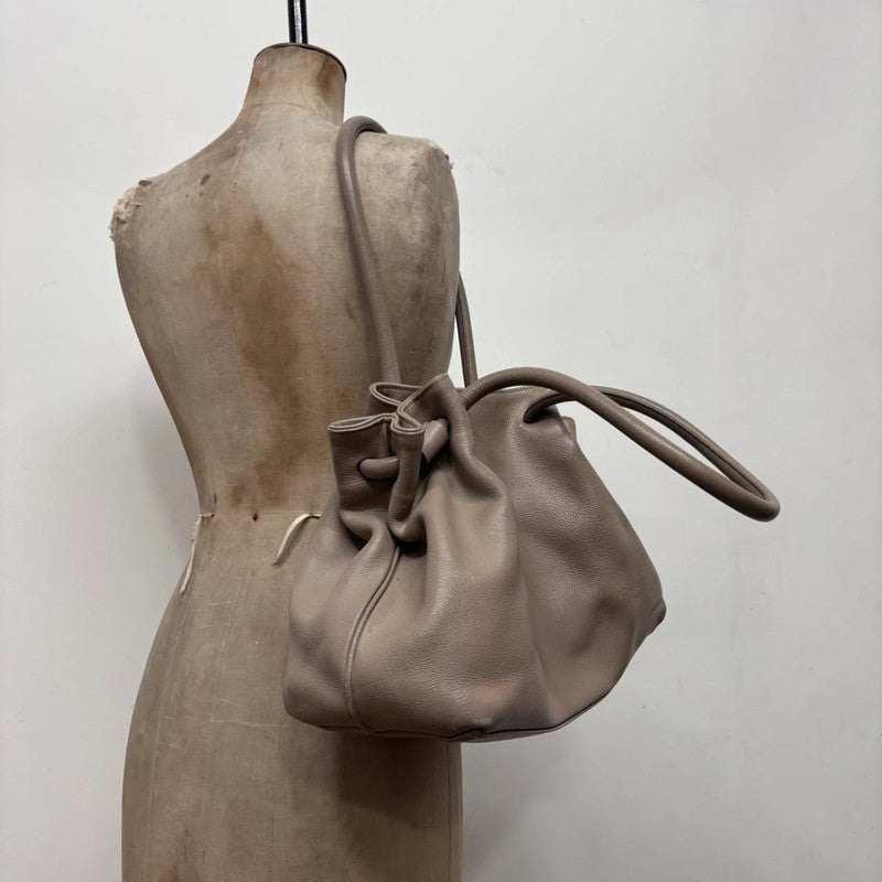 chunky oversized tan leather shoulder bag