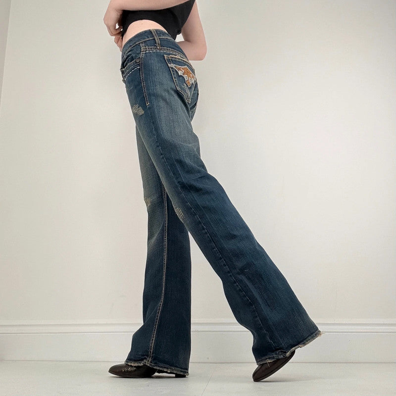 distressed denim low rise flared jeans