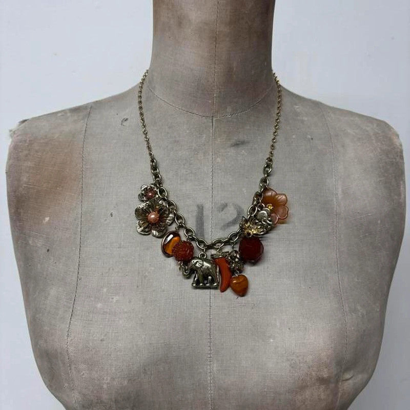 Gold flower elephant charm necklace
