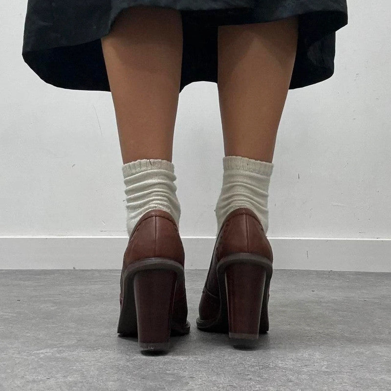 Twee tassel heeled loafer pumps