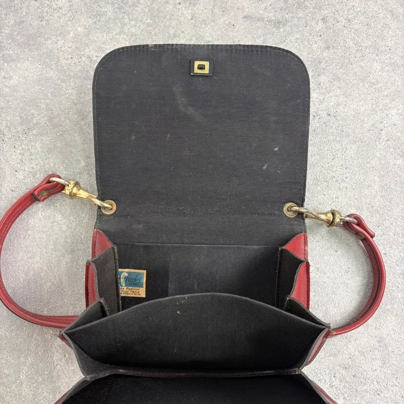 Red leather minimalistic shoulder handbag
