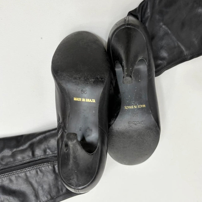 black pointed toe heel boots