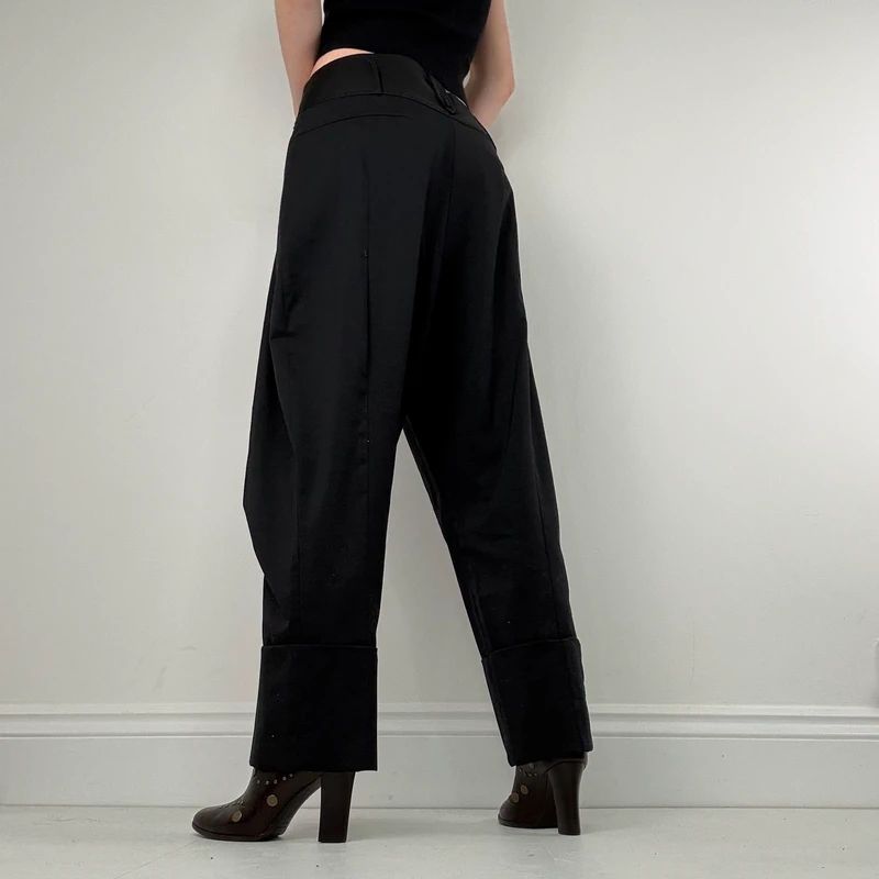 pleated black tailored trousers
