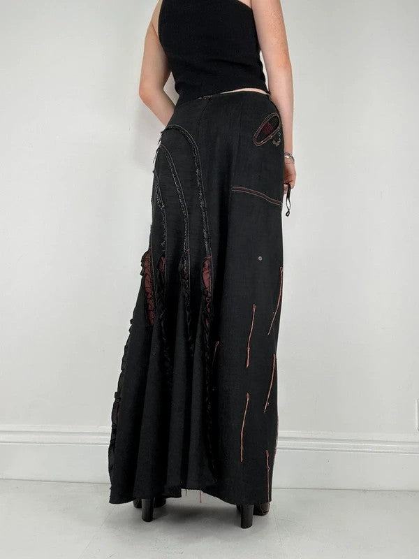 Flared black distressed maxi skirt