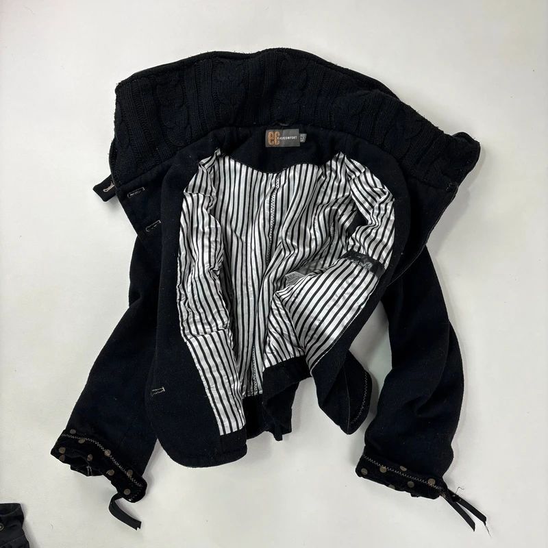 black structured asymmetric polkadot coat