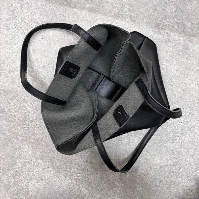 black faux leather tote bag
