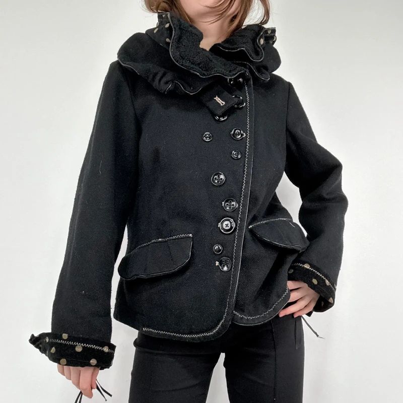 black structured asymmetric polkadot coat