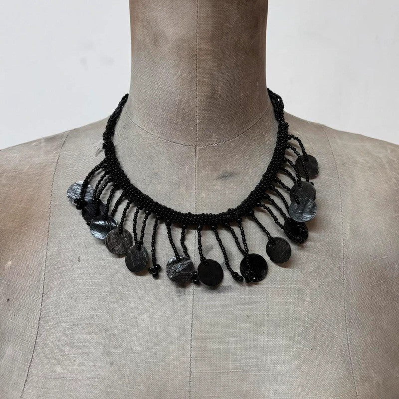 black beaded drape