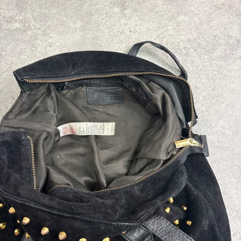 Black suede tote bag with gold studded spikes