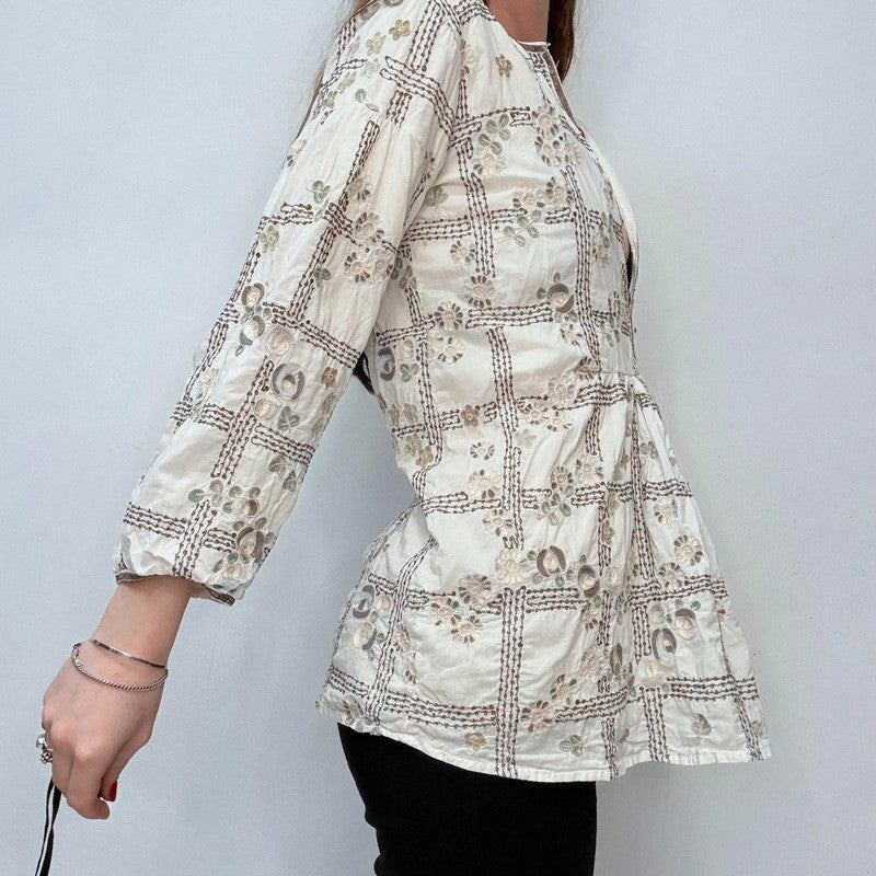 white embroidered flared puff sleeve shirt