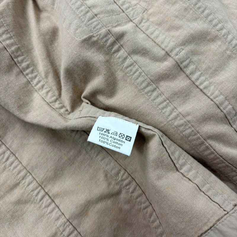 tan fitted panelled military jacket