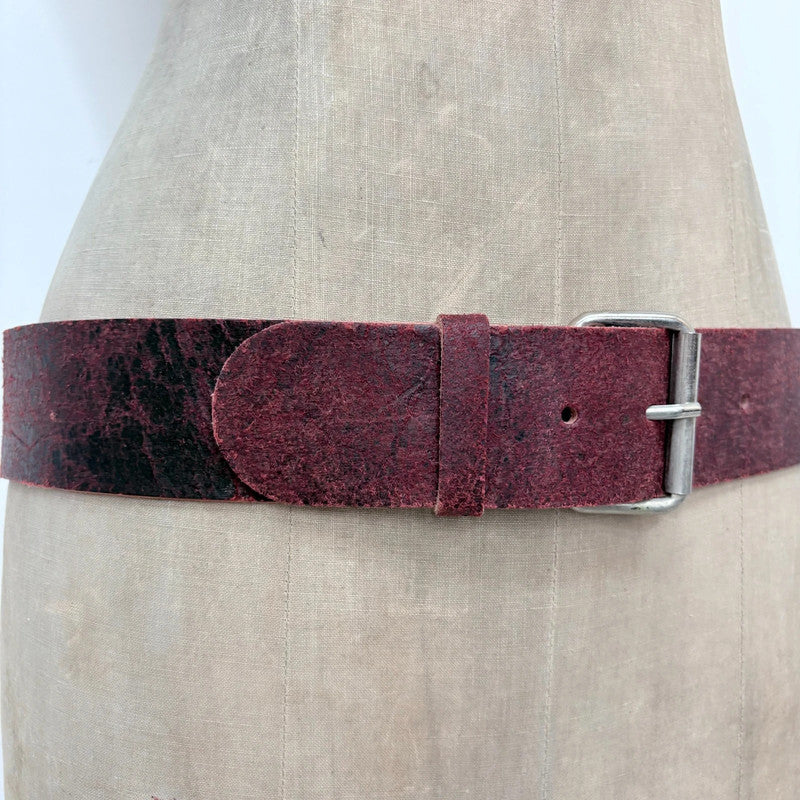 Distressed burgundy red leather belt