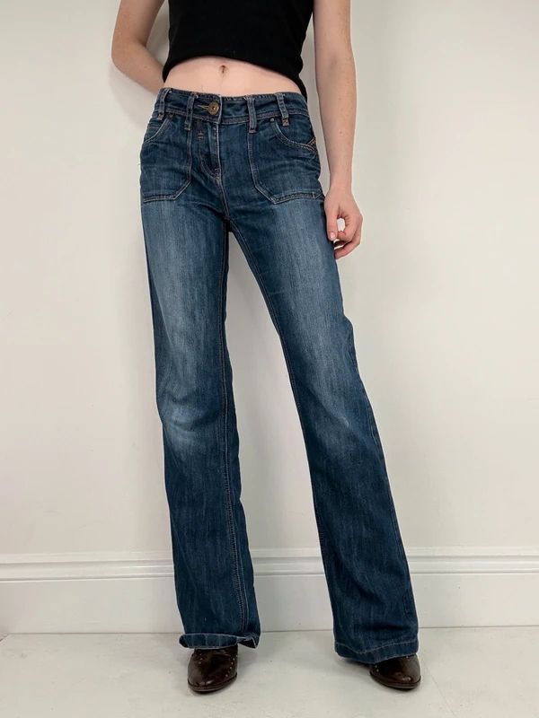 Low rise distressed buckle back Jeans