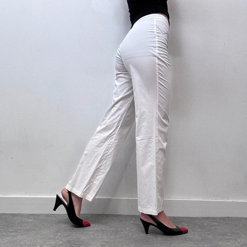 white minimalist flared trousers