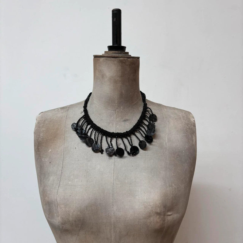 black beaded drape