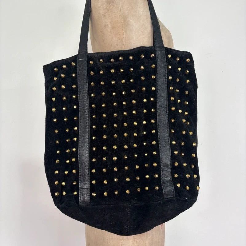Black suede tote bag with gold studded spikes
