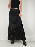 Flared black distressed maxi skirt