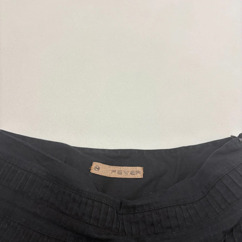 black pleated drop waist midi skirt