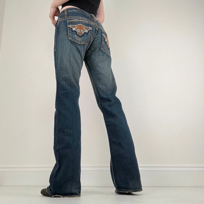 distressed denim low rise flared jeans