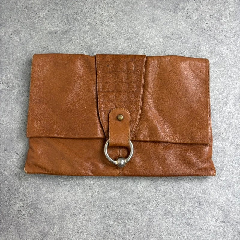 tan lather piercing punky silver hardware clutch bag