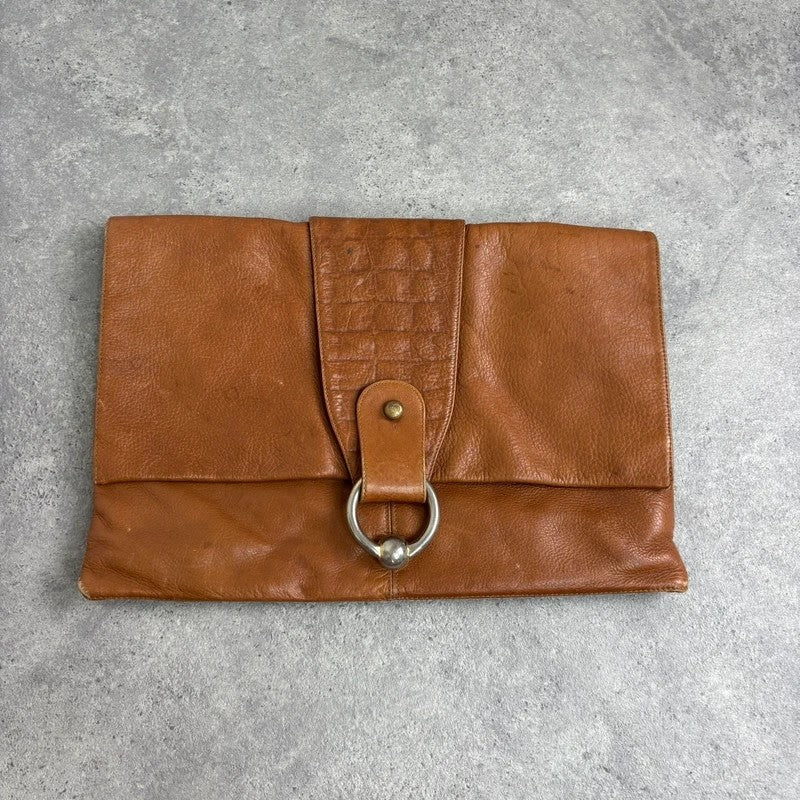 tan lather piercing punky silver hardware clutch bag
