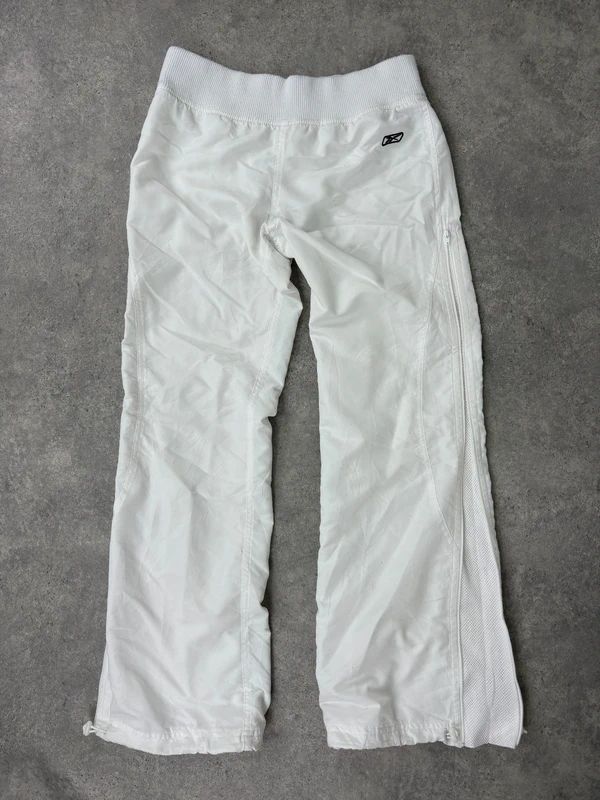 low rise white Reebok tracksuit bottoms