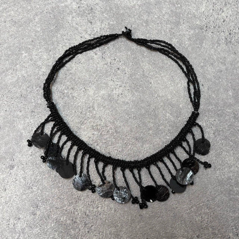 black beaded drape