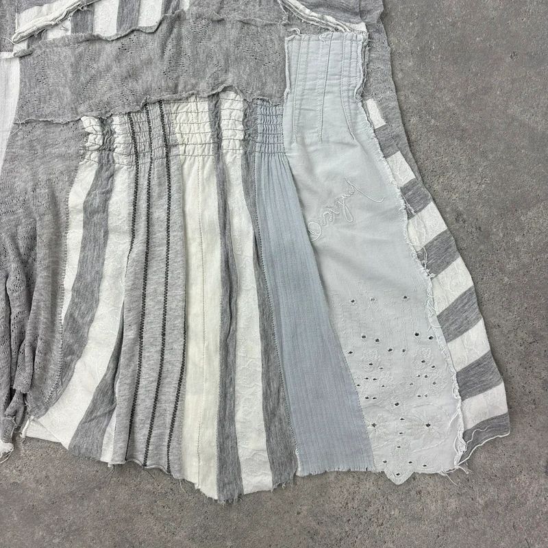 grey striped patchwork asymmetric vest