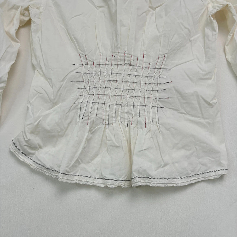 white cinched pleated flared shirt