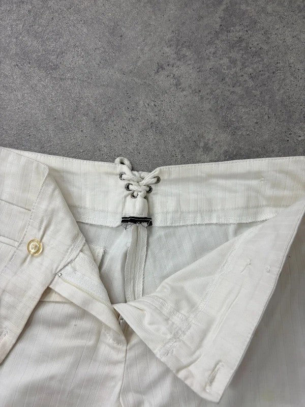 Lot rise white cotton pinstripe flared trousers