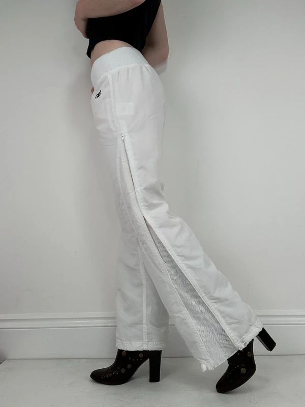 low rise white Reebok tracksuit bottoms