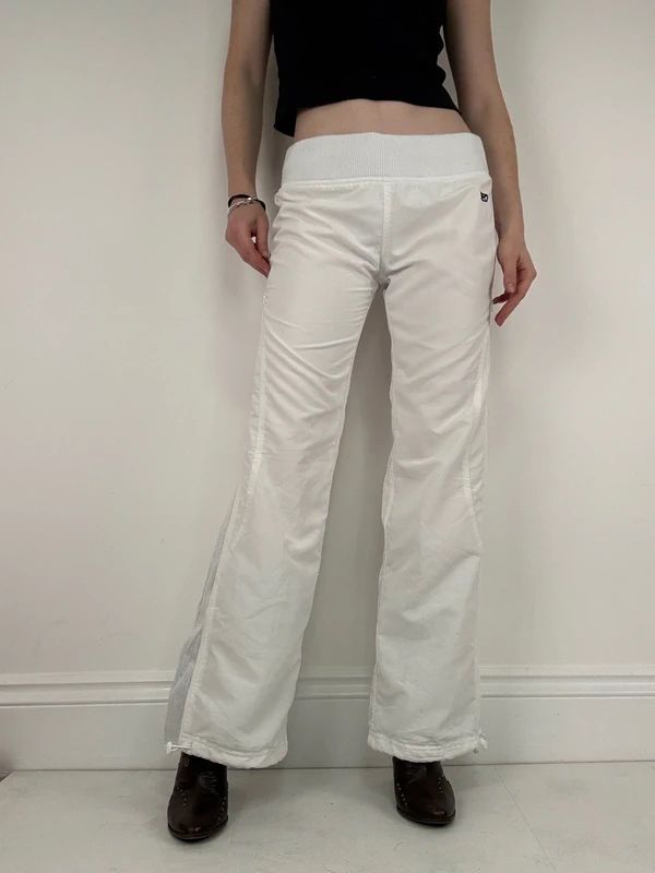 low rise white Reebok tracksuit bottoms