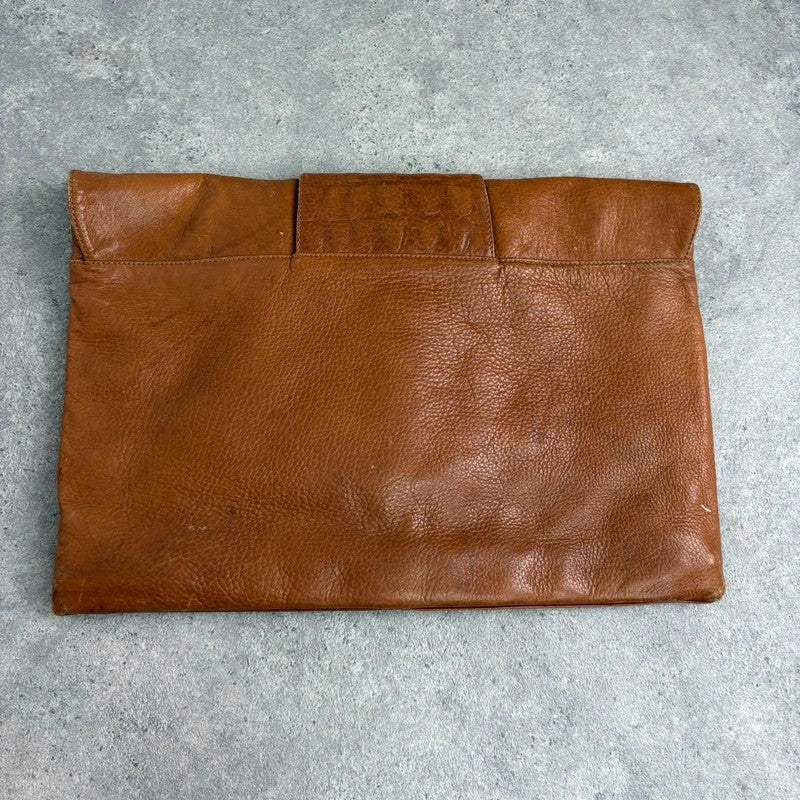 tan lather piercing punky silver hardware clutch bag