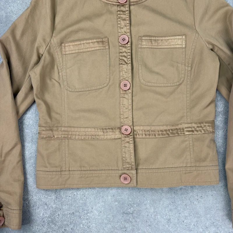 tan boxy cropped fit jacket with exposed button detail