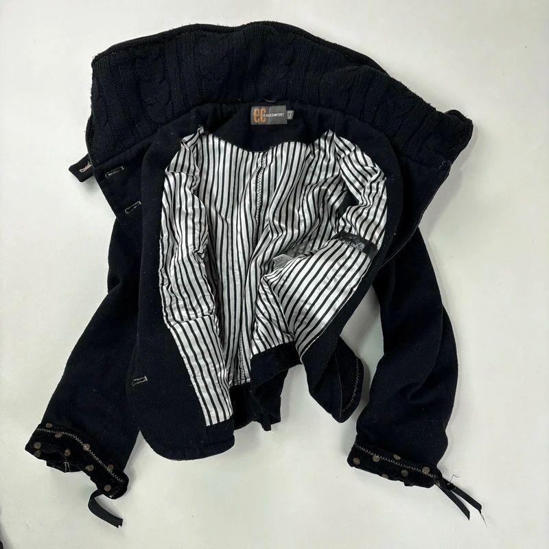 black structured asymmetric polkadot coat