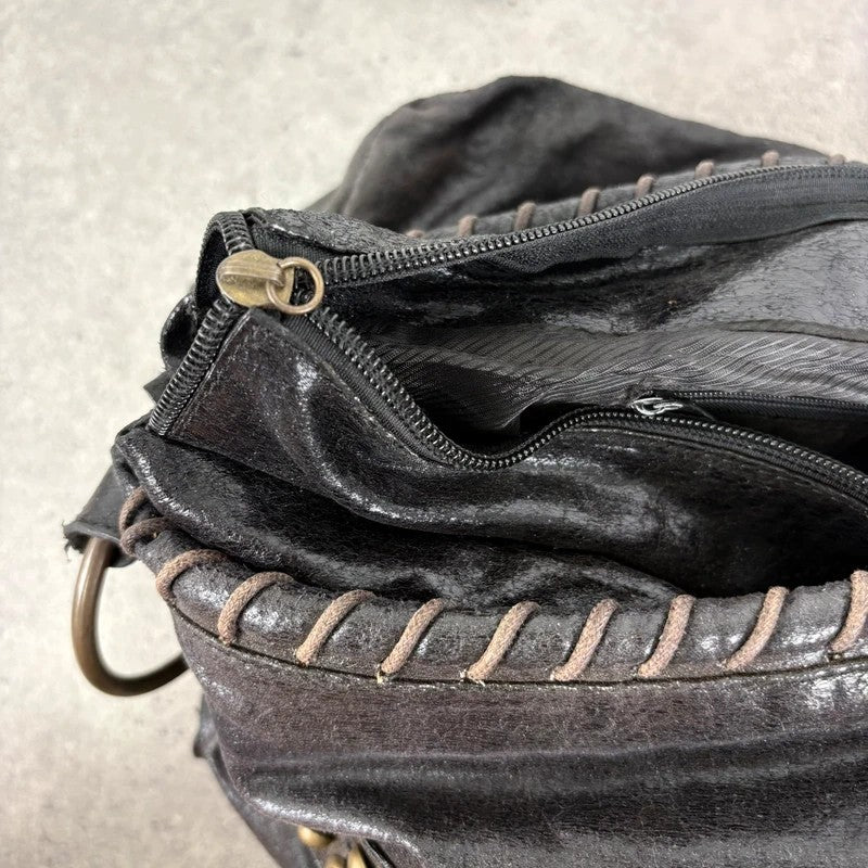Black studded stitched slouchy shoulder bag