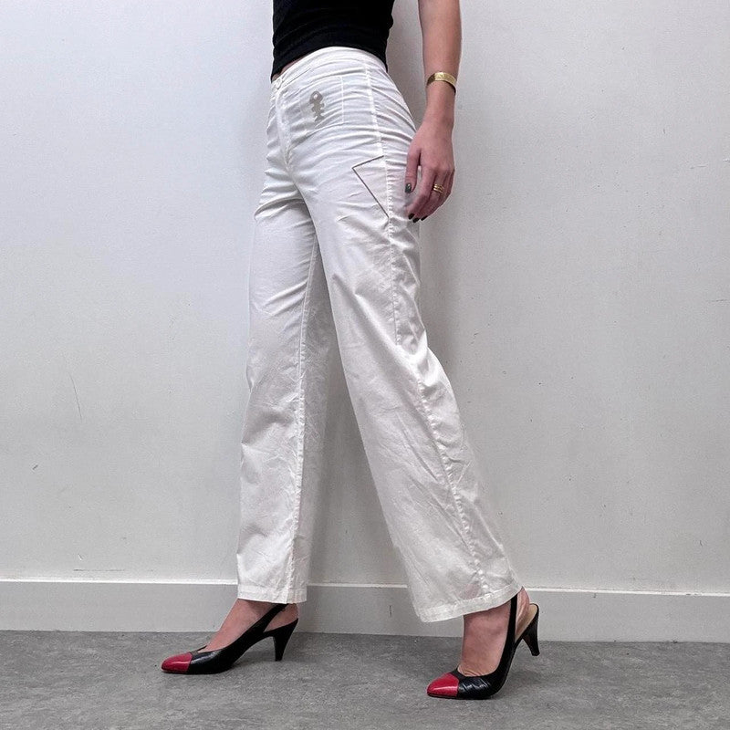 white minimalist flared trousers