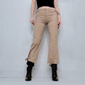 tan flared buckle utility pants