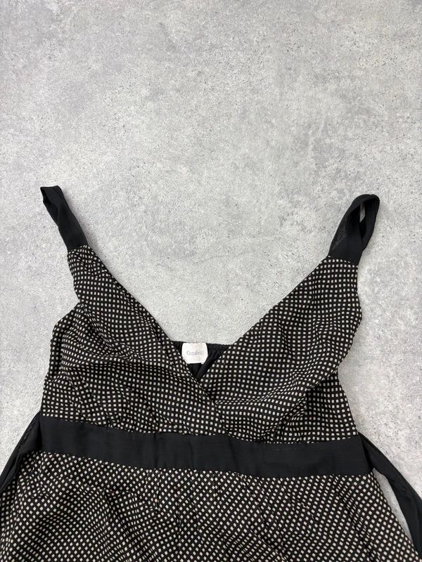 black polkadot flared midi dress