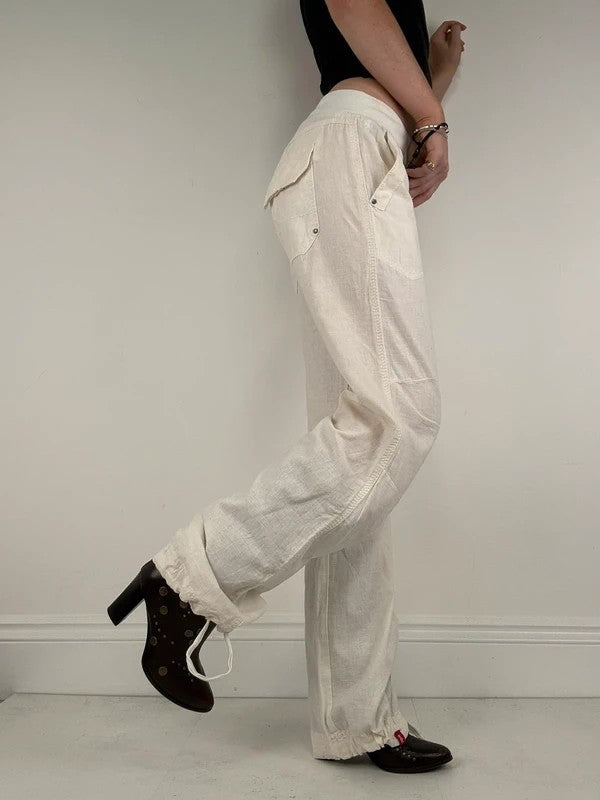White low rise wide leg flared linen trousers
