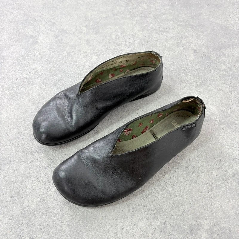 Black leather camper ballet flats