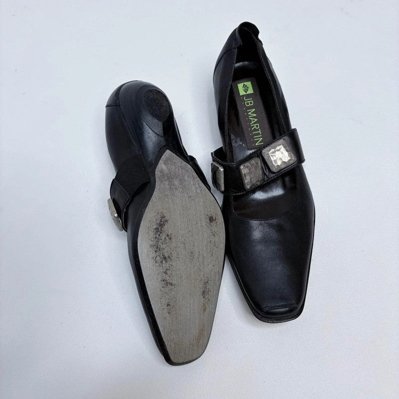 black pointed studded ballet flats