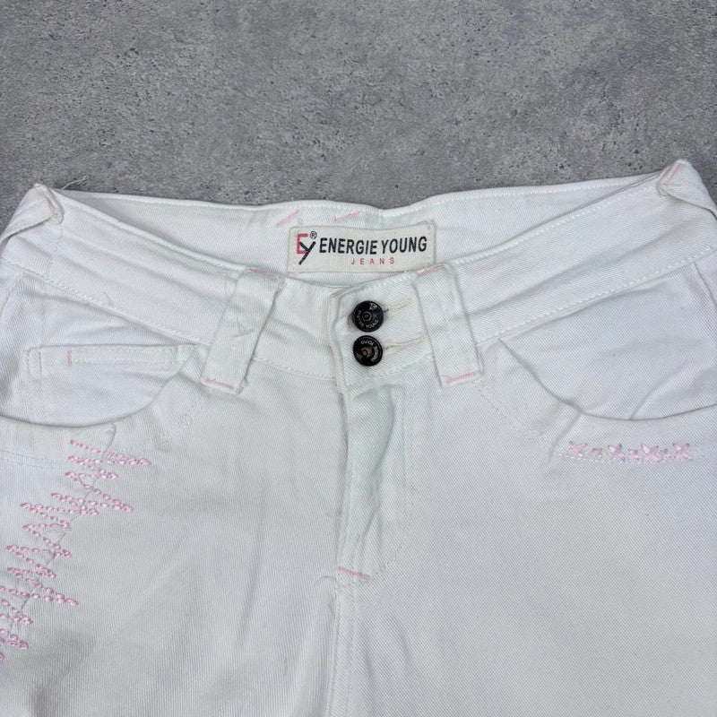 white low rise distressed stitched jeans
