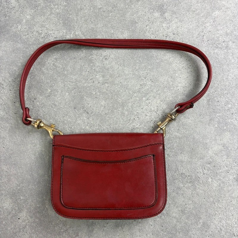 Red leather minimalistic shoulder handbag